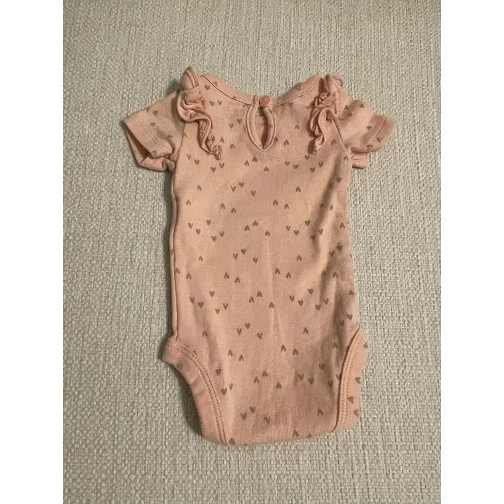 Carter’s Bundle of  4 (four) Preemie / newborn onesies.